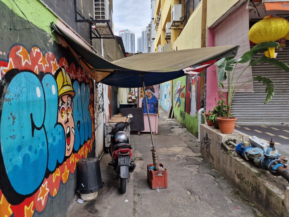 Ulička s pouličným umením Street art v Kuala Lumpur