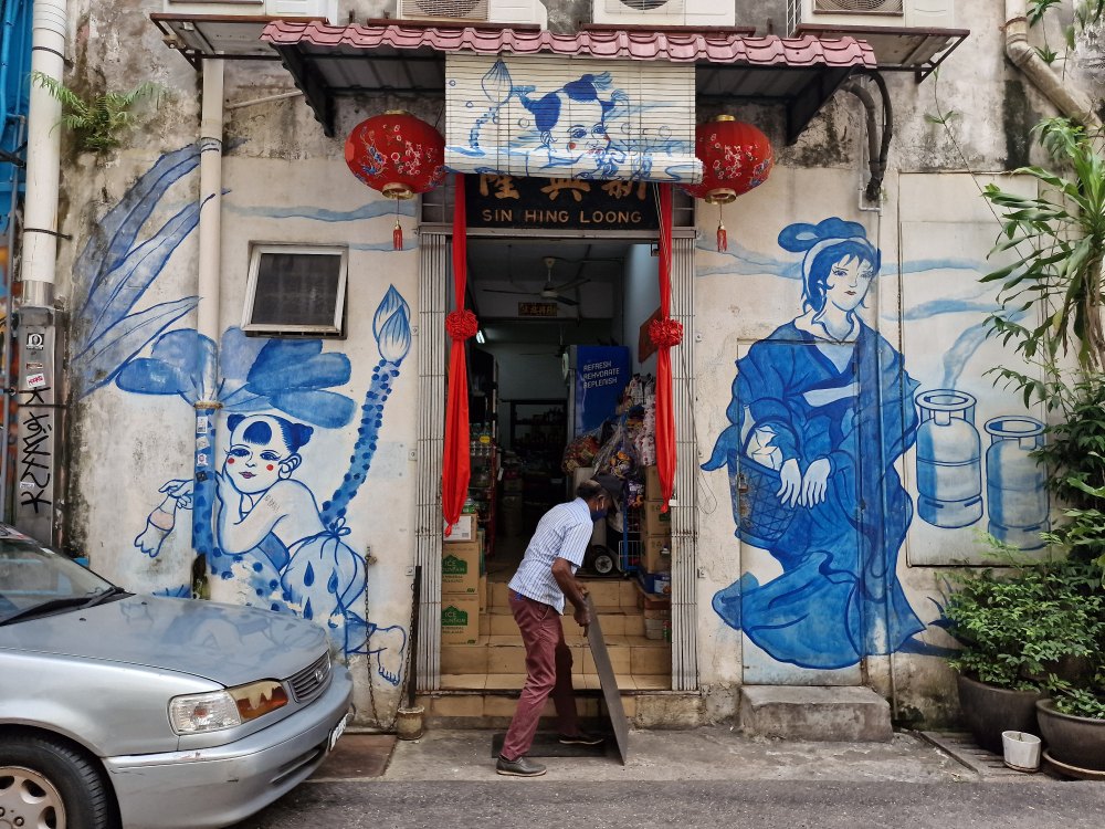 Ulička s pouličným umením Street art v Kuala Lumpur