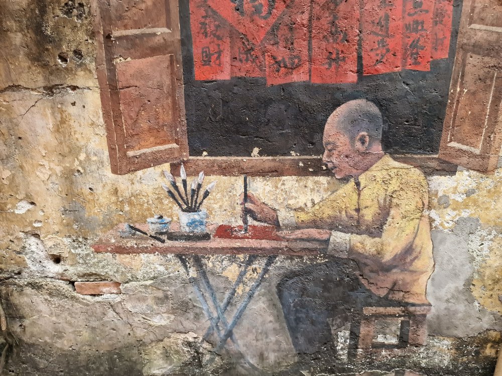 Ulička s pouličným umením Street art v Kuala Lumpur