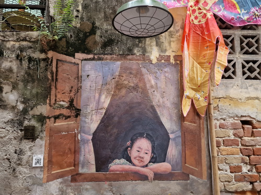 Ulička s pouličným umením Street art v Kuala Lumpur