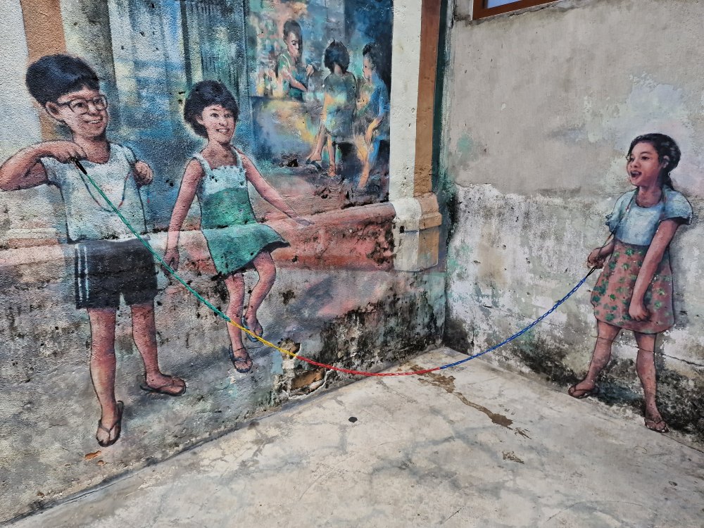 Ulička s pouličným umením Street art v Kuala Lumpur